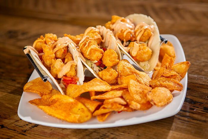 Shrimp tacos with house-made potato chips