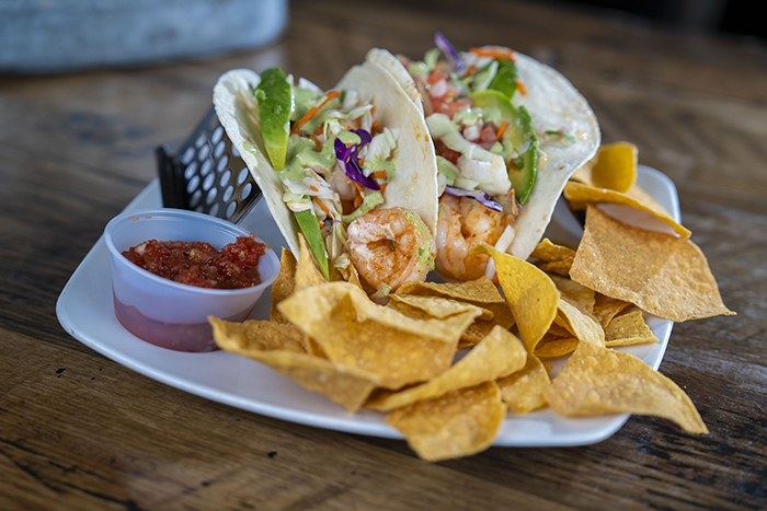 Seasoned grilled shrimp with avocado and cabbage mix, drizzled with our house-made cilantro-lime sauce. Served with chips and salsa.